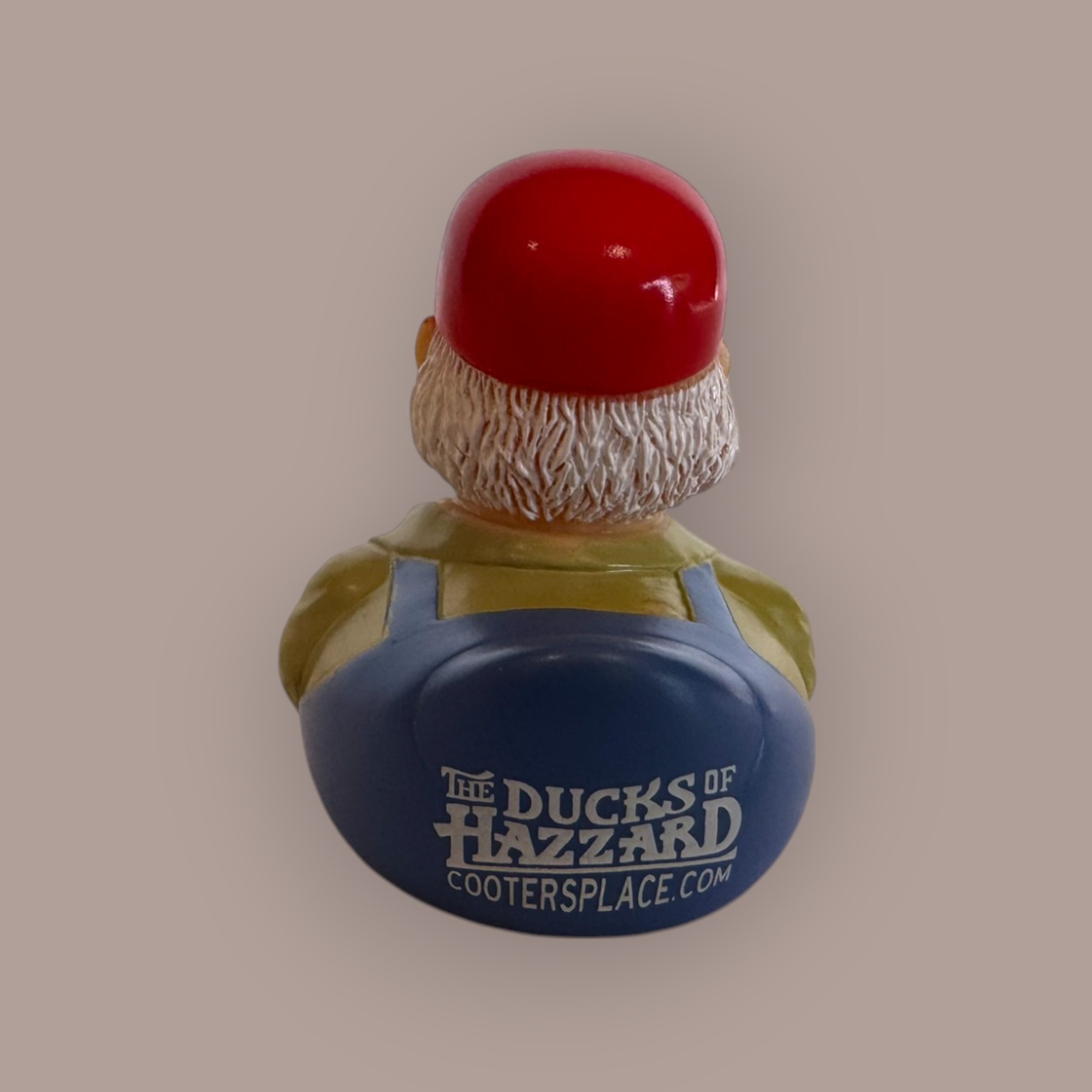 Cooter duck figurine — back view showing Ducks of Hazzard branding