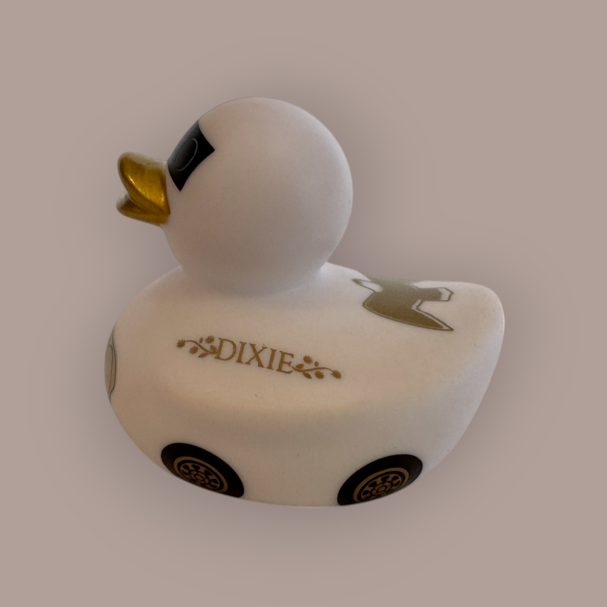 Dixie duck — back view with Dixie script and car silhouette